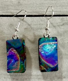 Beautiful textured rainbow colored pattern dangle/drop earrings made with sterling silver ear wire Handmade Iridescent Drop Earrings, Iridescent Czech Glass Dangle Earrings, Iridescent Ear Wire Earrings For Gift, Handmade Iridescent Czech Glass Earrings, Iridescent Czech Glass Drop Earrings, Iridescent Czech Glass Earrings For Gift, Ear Wire, Fused Glass, Rainbow Colors