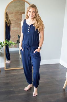 Womens Jumpsuit | Navy Front Button – MOB Fashion Boutique Button Closure Jumpsuits And Rompers For Loungewear, Jumpsuits And Rompers With Button Closure For Loungewear, Casual Stretch Jumpsuits And Rompers For Loungewear, Casual Solid Color Jumpsuits And Rompers For Loungewear, Casual Solid Color Loungewear Jumpsuits And Rompers, Casual Stretch Jumpsuits For Loungewear, Spring Loungewear Jumpsuits And Rompers With Buttons, Cotton Jumpsuits And Rompers With Buttons For Day Out, Casual Stretch Jumpsuits And Rompers For Lounging