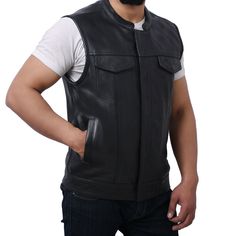 Style and function combined to offer you a Jett Men's Motorcycle leather vest. It is made using cowhide leather, which is exceptionally durable and supple. The mesh lining improves ventilation, keeping you cool and comfortable even in hot weather. The Jett Vest was designed to be versatile and suitable for both casual and active lifestyles. Its sleek and sophisticated style complements any outfit, and its lightweight build and portability make it ideal for travel or outdoor pursuits. If you like Casual Sleeveless Outerwear For Biker Events, Outdoor Leather Vest With Pockets, Fitted Leather Vest For Streetwear, Fall Biker Vest For Outdoor, Fall Outdoor Biker Vest, Casual Sleeveless Vest For Biker Events, Black Leather Moto Vest, Biker Leather Vest For Streetwear, Black Leather Vest With Pockets