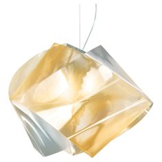 a white and yellow light hanging from a ceiling fixture in the shape of an ornament