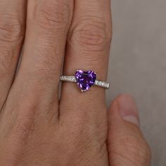 This is a gorgeous handmade creation. Its beauty is its simplicity & Elegance. The 8 mm heart cut faceted natural amethyst is crafted in solid sterling silver and with rhodium plated. All item is sent in a beautiful gift box You can realize more lovely stuff clicking the link https://www.etsy.com/shop/knightjewelry?refshopsection_shophome_leftnav Please leave the correct address and you phone number for delivering successfully. Elegant Amethyst Heart-shaped Birthstone Ring, Heart Shaped Jewelry With Center Stone For Proposal, Heart-shaped Jewelry With Center Stone For Proposal, Elegant Heart-shaped Amethyst Ring With Accent Stones, Heart-shaped Birthstone Ring For Promise, Heart Cut Diamond Rings For Proposal, Gemstone Heart Cut Promise Ring, Heart-shaped Amethyst Ring With Accent Stones, Fine Jewelry Heart-shaped Amethyst