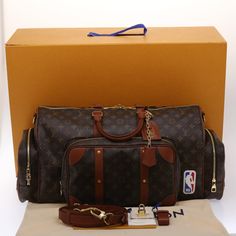 Brand: Louis Vuitton Model: Monogram NBA Gym Bag Boston Bag Color: Brown Material: Canvas Inclusions: Dust Bag / Item Box / Padlock / Key×2 / Clochette / Name Tag / Shoulder Strap Dimensions: W65cm x H35cm x D29cm Serial number: NA Country of origin: Italy Condition: AB - good condition. The Louis Vuitton Brown Monogram NBA Gym Bag in Monogram Canvas exudes sporty elegance and luxury. Crafted from the iconic Monogram canvas adorned with the NBA logo, this Boston Bag showcases Louis Vuitton's com Brown Monogram Canvas Rectangular Bag, Brown Monogram Canvas Bag With Large Capacity, Designer Brown Bag With Original Box, Leather Travel Bag With Original Box, Luxury Satchel Travel Bag For Errands, Brown Monogram Canvas Pouch Satchel, Travel Top Handle Monogram Canvas Bag, Luxury Rectangular Duffle Bag For Errands, Designer Rectangular Bags For Trips