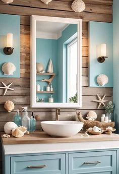 a bathroom with blue walls and white sink under a large mirror on the wall, along with seashells