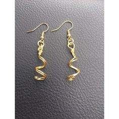 Handcrafted with love and care, this piece is also customizable to the metal color you prefer! Modern Twist Dangle Earrings As Gift, Modern Twist Metal Earrings As Gift, Modern Twist Dangle Earrings For Gift, Modern Twist Metal Earrings For Gift, Modern Twist Dangle Jewelry For Gifts, Handmade Earrings With A Modern Twist As A Gift, Hypoallergenic Spiral Metal Earrings, Gold Swirl Metal Earrings, Modern Twist Swirl Earrings For Gifts