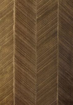 an abstract wallpaper pattern in gold and brown tones with vertical lines on the left side