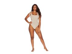 Beach Riot Sydney One-Piece - Women's Swimsuits One Piece : Tan : Beach Riot Sydney One-Piece is thoughtfully designed to offer you complete comfort while being stylish at the same time. Adjustable tie strap detailing. Slimming waist feature. 80% nylon, 20% lycra. Hand wash, lay flat to dry. Made in the USA. If you're not fully satisfied with your purchase, you are welcome to return any unworn and unwashed items with tags intact and original packaging included. Tie Straps Swimwear For Beach, Solid Color Swimwear With Tie Straps For Beach, Summer Swimwear With Tie Waist And Stretch, Vacation Swimwear With Tie Waist And Stretch, Stretch Poolside Swimwear With Tie Straps, Stretch Swimwear With Tie Straps For Poolside, Chic Summer Swimwear With Tie Straps, Stretch Swimwear With Tie Waist For Pool, Stretch Swimwear With Tie Waist For Vacation