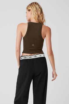 The name says it all: The Goddess Ribbed Go-To Tank fits like your best basic tank, with a racerback and cropped hem—but it’s made from a buttery-soft, ribbed performance fabric that’s perfect for practice. Layer it over a sports bra for movement, then pair it with trousers for an effortless street-style look. Womens Onesie, Tank Top Bras, Womens Capris, Tank Top Long Sleeve, The Goddess, Street Style Looks, Alo Yoga, Performance Fabric, Bra Women