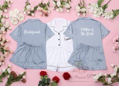 This personalized bridesmaid pajama set is crafted from high-quality satin fabric that feels as delicate and soft as silk. It ensures a skin-friendly experience without irritation or itching, making it perfect for everyday wear. The design pays close attention to detail, featuring a short-sleeve button-down top and drawstring-free shorts, providing both comfort and style for adults. This set makes an ideal gift for a variety of occasions, including bridal showers, bachelorette parties, birthdays Fitted Satin Set For Wedding Night, White Summer Sleepwear For Bridesmaids, Blue Short Sleeve Sets For Wedding, White Satin Loungewear Sets, White Satin Pajama Party Sets, Summer Wedding Matching Set, Fitted Satin Sleepwear For Wedding, White Bridesmaid Gift Sets, Blue Satin Pajama Party Set