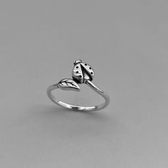 925 sterling silver Height: 9.6mm Finish: oxidized Can be worn: on multiple fingers and midi ring Symbolizes: protection, resilience, and good luck Dainty Silver Rings, Ladybug Ring, Bug Ring, Insect Ring, Midi Ring, Midi Rings, Star Ring, Cute Rings, Ring Dainty