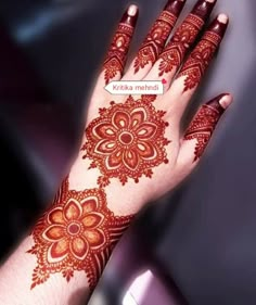 a woman's hand with henna on it and the words, bridal mehn