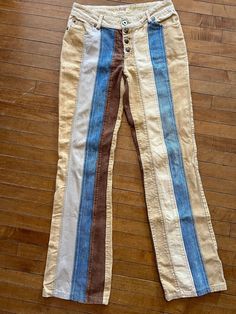 "\"Stone denim\" patchwork beige, blue and brown striped denim and corduroy vintage 90s flared pants. Button and snap fly in great condition. The size tag is faded. See measurements. These are low rise so the measurement of the waist is not at the true waist.  Unique and rare vintage 1990s find!!  Waistband (low rise hip) 27\" Hip34\" Rise 8\" Inseam 28\" Flare 16\" Thigh 18\" *these are very small and would probably fit someone who wears about a size 24 or 00 jean." Vintage Striped Pants, Flared Denim, Striped Denim, Vintage Mom Jeans, Vintage Mom, Striped Jeans, Print Pants, Blue And Brown, Denim Patchwork