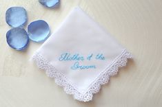 "Personalized hand embroidered handkerchief is a perfect gift! The embroidery is  completely by hand - not machine! This handkerchief is made from cotton, lace and measure approximately 12.5\"x 12.5\" (31cm x 31cm).  All orders are wrapped in a white envelope with a satin ribbon. The item's color may be different depending on your monitor settings." Embroidered Lace Handkerchiefs For Wedding, Wedding Cotton Handkerchief With Machine Embroidery, Embroidered Cotton Handkerchiefs For Weddings, Cotton Handkerchiefs With Lace Trim For Wedding, Blue Cotton Handkerchiefs For Wedding, Hand Embroidered Handkerchief, Wedding Gift For Mom, Monogram Wedding Gift, Mom Wedding Gift