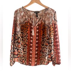 Stunning Tan, Cream, Brown And Orange Contrast Bohemian Style Top. Comes With Tassels At The Top To Alter The Neckline To Suit, Medium Length With Loose Fit. Soft Fabrication In A Animal Print. Condition: Nwot Measurements: Sleeves About 33” Length About 25” Relaxed Fit, Balloon Sleeves, Boho, Hippie, Retro, Aztec, Casual, Vintage, Gypsy Bohemian Leopard Print Top For Spring, Bohemian Leopard Print Spring Tops, Spring Bohemian Leopard Print Tops, Brown And Orange, Print Tunic, Tunic Blouse, Balloon Sleeves, Inc International Concepts, Boho Hippie