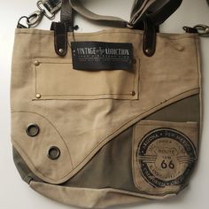 an old purse with some tags on it