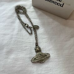 1 Stone Missing 16-17” Doesn’t Come With Original Packaging Not Sure About Authenticity, This Was Given To Me But Pls See All Photos For Condition Jewelry Vivienne Westwood, Vivienne Westwood Jewelry, Orb Necklace, Vivienne Westwood, Womens Jewelry Necklace, Jewelry Necklaces, Women Jewelry, Packaging, Stone