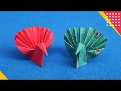 two origami animals sitting next to each other