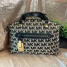 Classic Michael Kors Bag. Beige Background With Classic Black Mk Accents. Shoulder And Arm Strap With Gold Accents. Good Condition! Will Consider Reasonable Offers. Beige Background, Michael Kors Black, Michael Kors Bag, Black Cream, Gold Accents, Classic Black, Bag Lady, Michael Kors, Cream