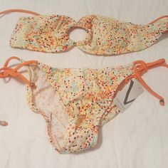 Brand New Venus Bikini Strapless Top. Great Pattern With A Tan! Orange Bandeau Swimwear For The Beach, Orange Bandeau Swimwear For Summer, Orange Strapless Swimwear For Pool, Orange Bandeau Swimwear For Beach, Orange Strapless Swimwear For Swimming, Summer Orange Bandeau Swimwear, Summer Party Orange Swimwear, Orange Summer Party Swimwear, Orange Bandeau Swimwear For Beach Season