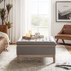 a living room scene with focus on the ottoman