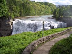 there is a large waterfall in the distance