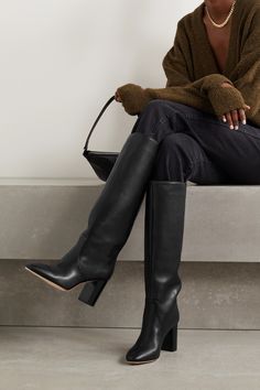 Knee boots are huge this season and it's so easy to see why - they're comfortable, stylish and make any outfit look chic. Loeffler Randall's 'Goldy' pair is made from smooth black leather and have almond toes and block heels for just the right amount of lift. The slightly wide cuffs ensure they'll fit nicely over jeans.<br><br>By purchasing this product, you are supporting responsible leather manufacturing through <a href="https://www.leatherworkinggroup.com">Leather Working Group.</a><br><br>This product was created using Considered Processes. Find out more about NET SUSTAIN <a href="https://www.net-a-porter.com/en-gb/campaigns/net-sustain">here.</a> Leather Boots Jeans, Wide Black Boots, Loeffler Randall Boots, Wide Boots Outfit, Denim And Boots Outfit, Knee High Boots Jeans, Jeans With Knee High Boots, Knew High Boots Outfits, Black Heeled Boots Outfit