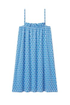 a women's blue dress with white flowers on it