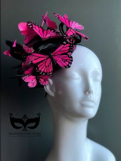 This elegant pink butterfly women's fascinator makes the perfect holiday gift! Featuring monarch butterflies in a variety of colors on a black fascinator base and headband/clip option. You have the option to pick other colors listed or a mix color option!   I N C L U D E D Black fascinator on headband base topped with high-quality intricately detailed butterflies.  In secure box packaging to keep form.  S H I P P I N G -  Processed same day or within 24 hours.  1-2 day guaranteed delivery, add i Whimsical Pink Headband Fascinator, Pink Carnival Headpieces, Pink Whimsical Costume Hats For Carnival, Whimsical Pink Costume Hats For Carnival, Whimsical Pink Costume Hats And Headpieces For Carnival, Summer Pink Hat As A Gift, Pink Carnival Headband Fascinator, Pink Headband Fascinator For Carnival, Whimsical Pink Headband Costume Hat