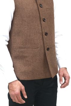 Nehru Collar waist coat/vest with five button closure at frontl. Luxurious Waist Coat/Vest is great for formal and occasional wear, . This garment comes with a slim fit and body wrapping shape , So kindly make sure to provide your proper measurement ,  You can get in multiple colours for the same, Perfect for any occasion be it formal, Party, New Year Christmas etc. Semi-formal Notch Lapel Vest For Winter, Tailored Nehru Jacket For Semi-formal Events, Brown Buttoned Vest For Formal Occasions, Winter Formal Nehru Jacket With Button Closure, Traditional Nehru Jacket With Buttons For Winter, Traditional Tailored Semi-formal Outerwear, Traditional Nehru Jacket For Winter, Fitted Nehru Jacket With Button Closure For Winter, Elegant Nehru Jacket With Buttons For Winter