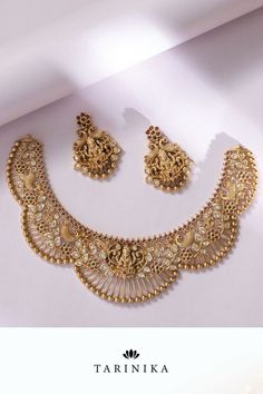 tarinika gianni antique necklace set Indian Gold Necklace Designs Unique, Elegant Gold Jeweled Kundan Necklace, Elegant Gold Jeweled Jewelry Sets, Elegant Festive Jeweled Temple Necklace, Heavy Gold Vintage Necklace, Heavy Vintage Gold Necklaces, Ornate Kundan Yellow Gold Necklaces, Festive Gold-plated Necklace With Intricate Design, Antique Gold Plated Jewelry For Wedding