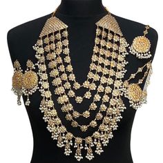 Pakistani bridal set. Includes- Mala Jhumar Tikka Earrings Gold Sets With Pallu For Marriage, Festive Bridal Necklace With Stone Work For Marriage, Chandbali Kundan Necklace For Marriage, Kundan Chandbali Necklace With Stone Work For Marriage, Kundan Chandbali Necklace For Marriage With Stone Work, White Jhumkas For Wedding, Meenakari Jewelry For Marriage On Diwali, White Bollywood Jewelry For Marriage, Bollywood Style White Bridal Sets With Latkans