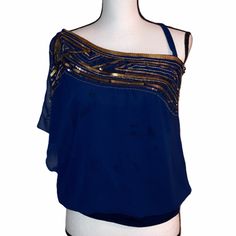 Brand New Without Original Tags Color Navy One Shoulder Is Split Sleeve Another Shoulder Has Strap Fully Lined Beautiful Bronze Tone Sequin Embellishment Hem Hugs Your Body In Mid Hip ( Depending On Your Hight) Sz M Great To Dress Up Or Dress Down With Jeans Bm Blue Tops With Asymmetrical Neckline For Summer, Chic Blue One Shoulder Top For Summer, Chic Blue Evening Top, Chic Blue Tops For Party, Blue Asymmetrical Top For Party, Blue One Shoulder Top For Night Out, Blue Summer Tops With Asymmetrical Neckline, Blue Asymmetrical Top For Summer, Asymmetrical Blue Top For Party