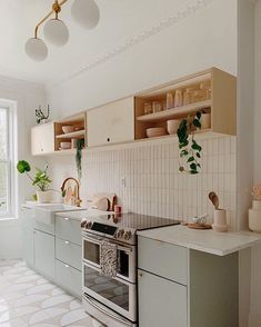 the kitchen is clean and ready to be used by someone who likes it on their phone