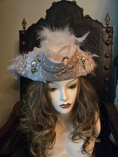 So, you're an elegant pirate...what's wrong with that?! Beautiful beige hat covered with fancy cream and tan trim, and filled with ivory feathers. Gorgeous gold medallions on each side. Stunning! 22.5" inside. Victorian Hat For Costume Party, Vintage Ceremonial Costume Hat With High Crown, Fancy Pirate, Costume Concepts, Tan Trim, Pirate Hat, Beige Hat, Pirate Hats, Gold Medallion