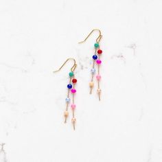 Delicate Rainbow beaded dangle earrings. Nickel free gold plated hooks. 14k Gold-filled Beaded Drop Earrings, Beaded 14k Gold Filled Dangle Earrings, 14k Gold Filled Beaded Dangle Earrings, Adjustable Chandelier Earrings With Colorful Beads, Colorful Dangle Beaded Earrings, Gold Tassel Dangle Earrings With Colorful Beads, Crystal Drop Earrings With Dangling Beads, Gold Dangle Earrings With Colorful Beads, Indie Earrings