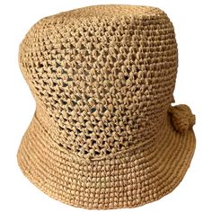 Crochet Bucket Hat This is our new design in semi-soft lace style raffia sun hat. A perfect summer hat for a beach lover  This hat features a carefully crocheted raffia cut out hat design with a short brim and a raffia tie to adjust to size. The cute decoration makes this a pretty summer hat ready to wear for any occasion. 🌀Natural organic raffia hat 🌀Beach Lover Hat 🌀Lightweight and easy to pack Size: Total Across approx:   11" or 28 cm Crown size or head size  Will fit up to 24" or 62 cm ap Raffia Sun Hat, Straw Crafts, Raffia Hat, Crochet Bucket, Crochet Bucket Hat, Hat Design, Hat Summer, Beach Lover, Summer Hat