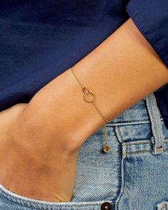 Crafted with luxe gold plating, this Crew Charm Bracelet is an elegant addition to any look. Featuring interlocking rings, this bracelet is dainty yet adjustable for any wrist size. A timeless design, this bracelet is the perfect accessory for any occasion. Crew Bracelet in 18k Gold, Women's by gorjana Delicate Adjustable Jubilee Chain Bracelet, Adjustable Yellow Gold Stainless Steel Bracelets, Elegant Metal Heart Bangle Bracelet, Elegant Adjustable Stainless Steel Heart Bracelet, Elegant Heart Bracelet With Adjustable Chain, Adjustable Yellow Gold Minimalist Heart Bracelet, Adjustable Minimalist Yellow Gold Heart Bracelet, Stainless Steel Chain Bracelet For Friendship, Elegant Gold Bracelets With Adjustable Clasp