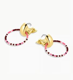 The Gigi Drop Hoops instantly elevate any outfit. This lightweight, statement-making style features a gold-plated huggie and colorful glass bead hoop for a unique drop earring. Easily style them with other gold or diamond stud earrings to complete your look! Total drop 1 5/16" Beaded hoop measures 15/16" Colored glass beads measure 1/16" Hinge closure Available in 18k gold plated brass Avoid contact with anything containing derivatives of alcohol Bead color and pattern may vary slightly Trendy Round Beaded Earrings, Trendy Clip-on Hoop Earrings, Trendy Clip-on Dangle Hoop Earrings, Trendy Gold Beaded Earrings With Colorful Beads, Trendy Gold Hoop Earrings With Colorful Beads, Trendy Small Hoop Beaded Earrings, Trendy Gold Hoop Beaded Earrings, Trendy Gold Beaded Hoop Earrings, Gold Hoop Earrings With Colorful Beads For Everyday