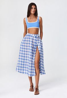 Breezy Beach Skirt With Elastic Waistband, Summer Breezy Gathered Skirt Bottoms, Breezy Gathered Skirt Bottoms For Summer, Breezy Gathered Skirt For Summer, Gingham Skirt For Summer Picnic, Blue Gathered Beach Skirt, Summer Gingham Skirt For Picnic, Summer Blue Gathered Skirt, Chic Gingham Skirt For Summer