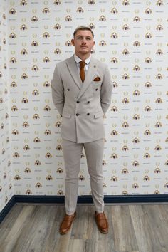 As seen on MK Dons Footballer Callum Hendry! If you are looking for a suave and versatile suit, add this men's double-breasted suit to your inventory.The fabric is made from soft and comfortable poly-viscose cloth, which has been enhanced with lycra for added stretch and flexibility. Features Slim fit Double-breasted blazer Notch lapel Double back vent Four button cuff Complimentary pocket square Functional inside and outside pockets to the blazer Style Tip | Accessorise with tan to match the ac Tailored Double-breasted Three-piece Suit, Tailored Double-breasted Suit, Double-breasted Tuxedo Three-piece Suit For Groom, Dapper Tailored Double Breasted Suit With Notch Lapel, Fitted Double Breasted Suit With Notch Lapel, Fitted Double Breasted Suit With Suit Collar, Tailored Dapper Double Breasted Suit For Workwear, Business Suits With Double-breasted Button Fastening, Dapper Suit With Suit Collar For Workwear