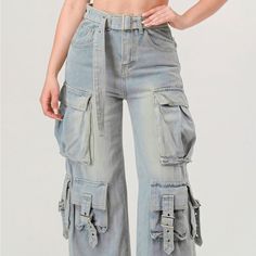 Elevate Your Wardrobe With Our Belted Denim Cargo Jean, A Contemporary Blend Of Utility And Style That Enhances Your Casual Ensemble With Functionality And Fashion-Forward Design. Crafted With Precision And Attention To Detail, This Jean Is Tailored To Elevate Your Everyday Look. Key Features: - Fabric: Made From Non-Stretch Denim With A Composition Of 95% Polyester And 5% Spandex, Ensuring Durability And A Structured Fit. - Fit: The Loose Cargo Jean Design Offers A Relaxed Fit, Ideal For Comfor Vintage Jeans With Cargo Pockets, High Rise Cargo Jeans With Belt Loops For Summer, Vintage High Rise Cargo Jeans For Spring, Light Wash Cargo Pants, Jean Color, Denim Cargo, Cargo Jeans, Designer Jeans, Colored Jeans