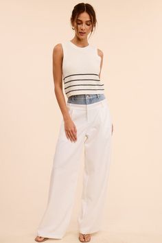 Introducing our on-of-a-kind White Wide Leg Denim Waist Trouser Pants, where casual meets dressy in perfect harmony. These trousers are designed with a unique denim waist band that adds a playful twist to the sophisticated silhouette. Complete with functioning front pockets and belt loops on both denim waist band and the actual pants. Our wide leg pants seamlessly blend style and practicality. Style Tip: Wear the White Wide Leg Denim Waist Pants with a sleek tank top to balance the look and show Perfect Harmony, Wide Leg Denim, White Pants, Waist Pants, Trouser Pants, Waist Band, Swimwear Tops, Kids Dress, Leg Pants