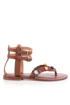 Step up your summer style with our handcrafted Brown Braided Leather Sandals! These open-toe sandals combine comfort and vibrant design, perfect for your casual yet stylish look.  Tan Color 👁️ Unique Design: Braided leather straps adorned with colorful, eye-like embellishments set you apart from the crowd. 🔗 Double Ankle Straps: Two adjustable metallic buckles ensure a secure and customizable fit. 🌞 Comfortable Sole: Crafted from premium leather, the sole provides comfort for all-day wear. 🌈 Versatile Style: A perfect match for both casual and slightly upscale outfits. 👣 Handmade Quality: Each pair is meticulously handcrafted, showcasing excellent craftsmanship and attention to detail. 👜 Lightweight & Packable: Ideal for travel, these sandals are easy to pack and won't weigh you down Bohemian Toe Post Sandals For Vacation, Bohemian Toe Post Sandals For Beach Season, Bohemian T-strap Toe Post Sandals For Summer, Adjustable Brown Sandals For Beach Season, Bohemian Toe Post T-strap Sandals For Summer, Bohemian T-strap Sandals For Beach, Bohemian T-strap Sandals With Toe Post For Vacation, Brown Toe Loop T-strap Sandals For Beach, Bohemian Open Toe T-strap Sandals For Vacation