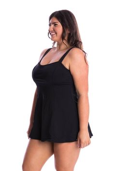 Black Plus Size Chlorine Resistant Swim Dress without Pant Your favourite swim dress style is now available in a new design. The new wide strap swim dress features the same dress design and shelf bra support, but without the built in pant. Enjoy the coverage and support of the original swim dress with the convenience of a two piece. Similar to a long line tankini, you can choose to wear your swim dress with your preferred chlorine resistant swim pant. Shelf-bra Moulded Cups Mastectomy Pouch Adjustable straps Fabric : 100% Polyester UPF 50+ Location model wears size 14 Studio model wears size 16 Jantzen Swimwear, Mastectomy Swimwear, Black Tankini Top, Swimwear Australia, Bra Support, Retro Swimwear, Black Tankini, Black Plus Size, Curvy Swimwear