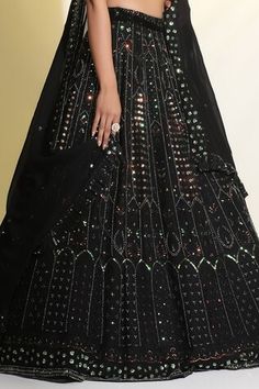 Black cancan attached lehenga featuring sequin, bead, cutdana, resham work all over. Paired with a sequin flower embellished padded blouse and dupatta. - Aza Fashions Embellished Wedding Sets, Glamorous Black Dresses For Reception, Black Embellished Sharara For Diwali, Festive Black Hand Embellished Sharara, Festive Hand Embellished Black Sharara, Festive Anarkali Set With Motifs For Party, Navratri Party Lehenga With Motifs, Party Lehenga With Motifs For Navratri, Festive Party Anarkali Set With Motifs