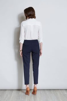 Sleek & timeless, this Slim Fit Ankle Pant is perfect for dressing up with its matching Single Button Blazer or pairing with Spring 's new knits and shirts. Featuring a slim leg & a pull on elastic back waistband, you will love the look & feel of these essential pants. T-Tahari Slim Fit Pant with Elastic Back Waistband Runs True to size Model is 5 '9 " and wearing a size S Imported Style #: THF17000A Essential Pants, Single Button Blazer, Slim Fit Pants, Slim Leg, Blazer Buttons, Pair Of Pants, Ankle Pants, Pull On Pants, Slim Legs