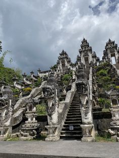 an elaborately carved staircase leading to the top of a building