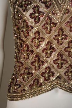 For Sale on 1stDibs - This Galanos blouse is composed of a beaded and sequin appliqued silk, in gold and burgundy hues. The top features a 3-dimensional beading technique. There Beaded Clothing, Fantasy Ball, Elizabethan Fashion, Embellishment Ideas, Tambour Beading, Tambour Embroidery, Beadwork Embroidery, Couture Embroidery, Beaded Blouse