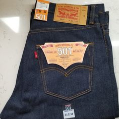 Levi's 501original Fit Shrink-To-Fit Size 34x34 This Will Shrink 1" In The Waist And 3 In Lenght. After Being Wash Size Will Be 33x31 Color Rigid * 100% Cotton * Regular Through The Thigh * Sits At Your Waist * Straight Leg * Front Rise: 12 1/4'' * Knee: 18 5/8'' * Leg Opening: 17'' 501 Levis Mens Outfit, 501 Levis Mens, Outfit Cowboy, Levi 501s, Blue Jeans Mens, Levis Shirt, Purple Jeans, Acid Wash Jeans, Levi’s 501