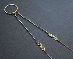 Both an eyeglass holder lanyard, and a necklace! :) * Leaf brass chain * White enamel brass chain * Round brass components * Small gold plated chain * Brass circle link (0.1875in/30mm)* Around 32in (81cm) chain size all around. (Can be made shorter if you prefer! Simply contact me and we can arrange that quickly!) :) USEFUL TIPS: * Will fit glasses temples as wide as 1in (25mm). * Simply fold your glasses' temples and slip one in the circle link. The rest of the time, the lanyard is simply a pre Adjustable Gold Minimalist Glasses Chains, Gold Minimalist Adjustable Glasses Chains, Gold Minimalist Glasses Chain With Adjustable Feature, Minimalist Gold Adjustable Glasses Chain, Gold Minimalist Glasses Chains With Adjustable Chain, Adjustable Silver Glasses Chains With Delicate Chain, Gold Metal Glasses Chains With Lobster Clasp, Adjustable Gold Glasses Chains With Lobster Clasp, Eyeglass Necklace Holder