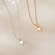 A timeless classic to treasure each day, our Mini Cross Charm Necklace is perfect for commemorating those special moments. Gift to a loved one or cherish your new favorite necklace in either 18K Champagne Gold Plated or 925 Sterling Silver.&nbsp;18K Champagne Gold Plated or 925 Sterling SilverMini Cross: 0.3 x 0.2Charms are removable from this chain and can be worn on all Merci Maman chain lengthsSent with love in a complimentary gift box Spiritual Rose Gold Sterling Silver Necklaces, Spiritual Style Rose Gold Sterling Silver Necklace, Spiritual Rose Gold Sterling Silver Necklace, Gold Sterling Silver Fine Jewelry Necklaces, Sterling Silver Tarnish Resistant Pendant Necklace, Everyday Gold Necklaces With Polished Finish, Everyday Gold Necklace With Polished Finish, Classic Pendant Charm Necklace With Polished Finish, Gold Polished Sterling Silver Necklaces